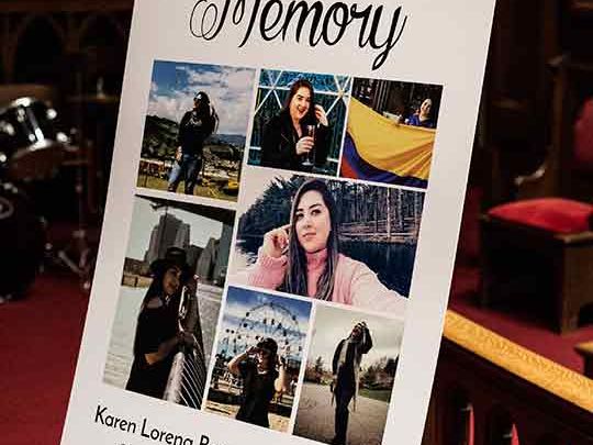 A sign on display at a memorial service for Karen Bermudez-Rodriguez 
