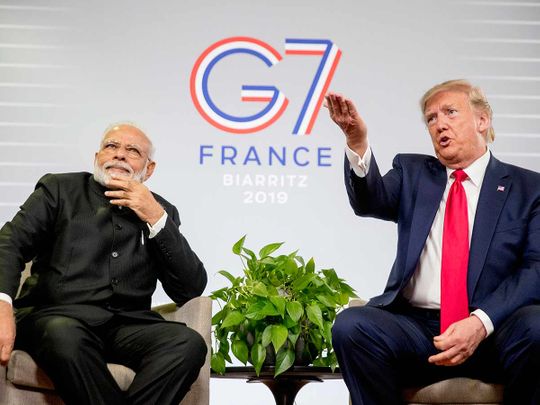 Donald Trump with Modi at a G7 media briefing 