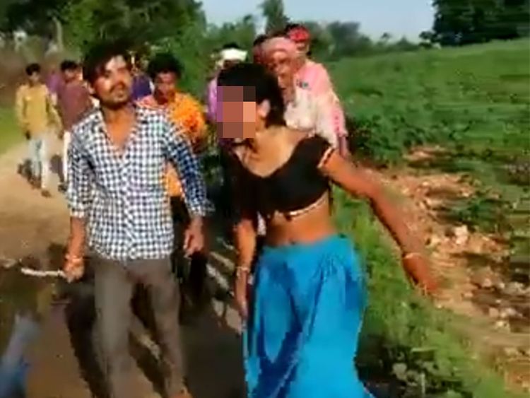 Forest Nudes - India: Woman beaten up, paraded half-naked over inter-caste ...