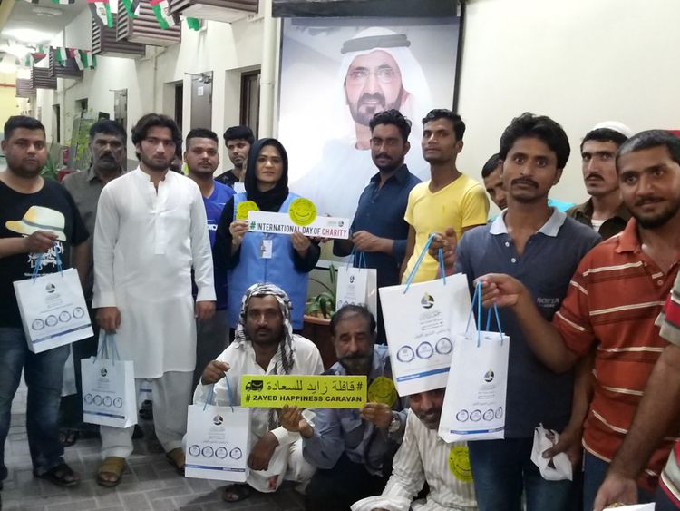 Laborers, doctors & officials from Dar Al Ber Society at labour camp for Medical Camp on the occassion of International Day of Charity - 05-09-2019 pic  2-1567772995830