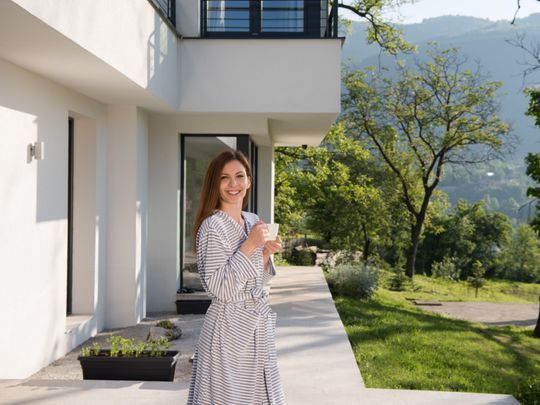 ONP 190906 Woman outside her house-1567771493544