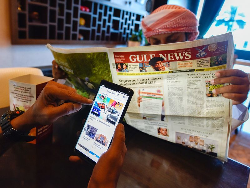 People reading Gulf News