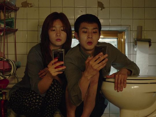 Woo-sik Choi and So-dam Park in Parasite-1569935881100