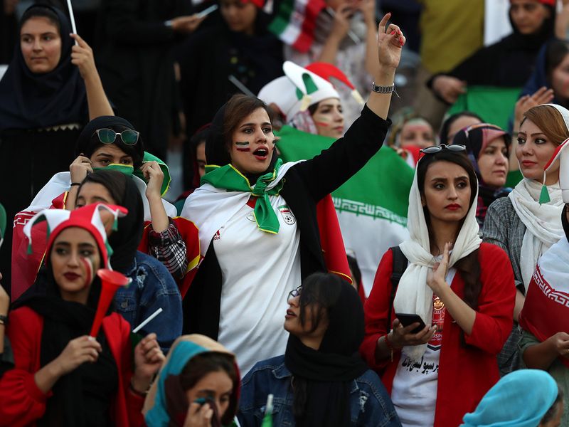 proud woman iran football fan