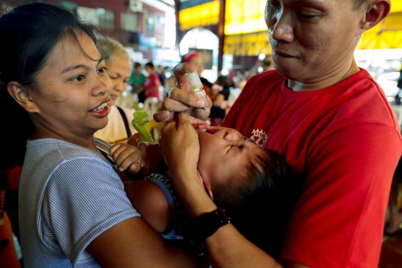 Copy of 2019-10-14T072418Z_822364768_RC16B58F3200_RTRMADP_3_PHILIPPINES-POLIO-VACCINATION-1571120295537
