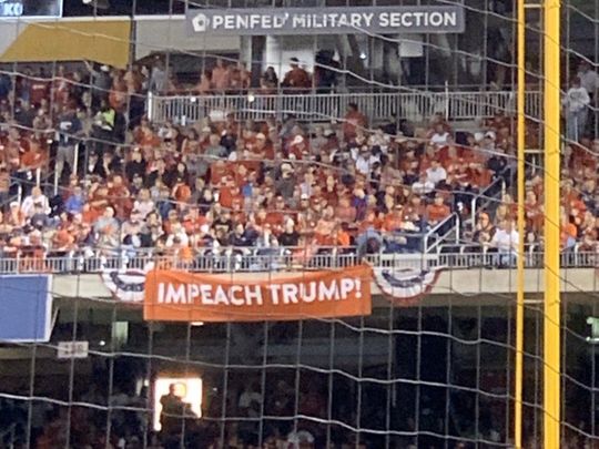 Trump protestors at baseball game