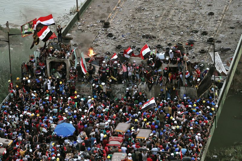 REG Iraq protests.-1572588393232