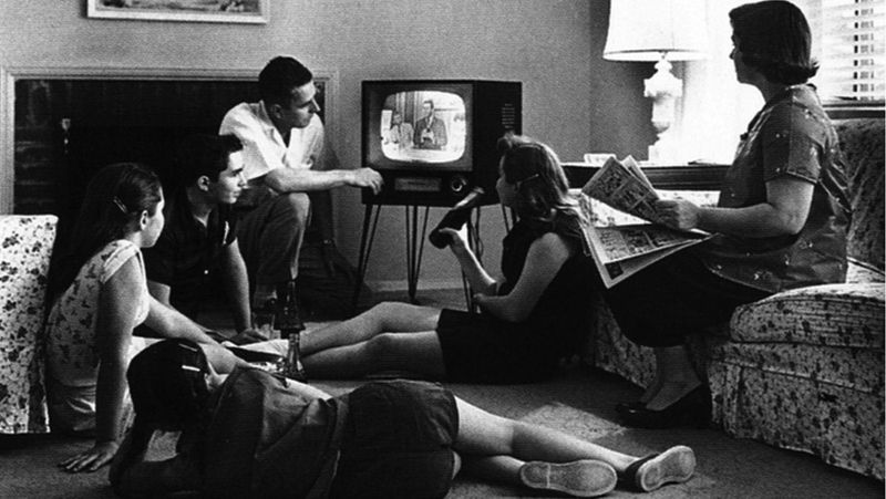 A family watching television US 1950s