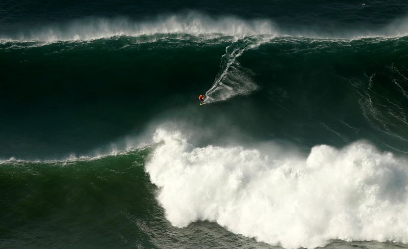 Pictures: Extreme surfers flock to Portugal’s Nazare to catch record ...