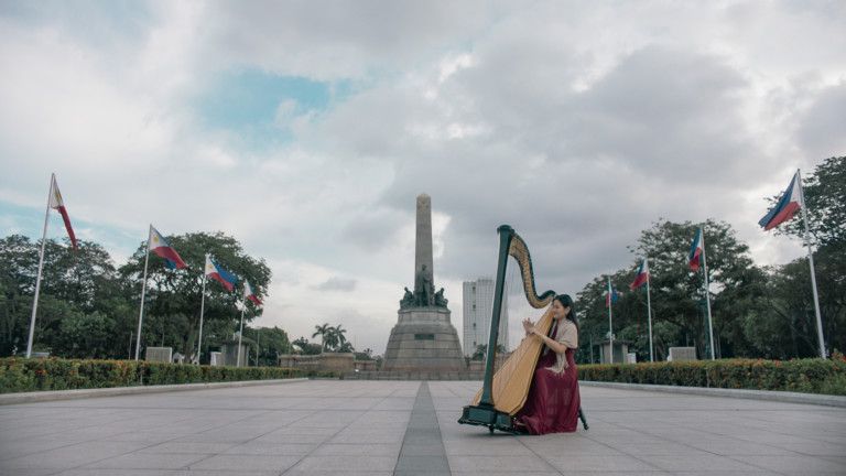 Expo 2020 - National Day Video 2019 - Filipina harpist Madeline Jane Banta in Rizal Park in Manila-1575184715474