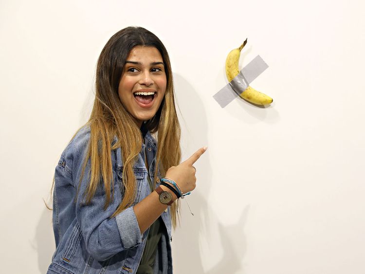 Image result for Maurizio Cattelan: a banana simply stuck on a wall, which sold for $120,000.00"