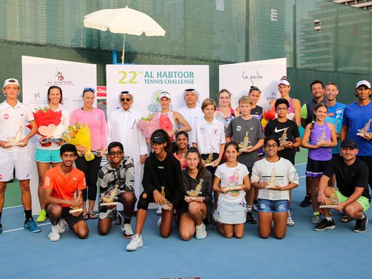 The Habtoor champions and their trophies