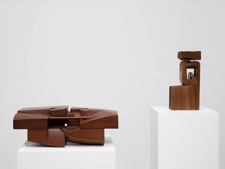 WKR 191219 Chaouki Choukini - horizontal work is Lieu, 1992 in green ebony; vertical work - Ramses, 1981 - Iroko wood.-1576927041185