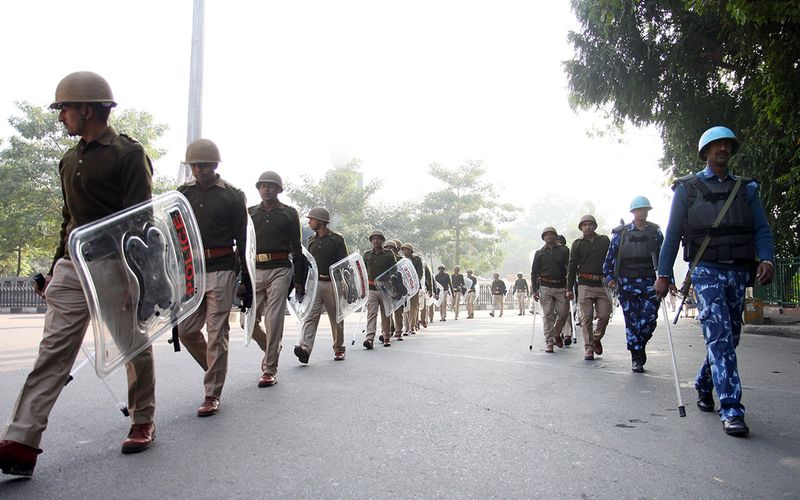  Police and Rapid Action Force conduct a flag march