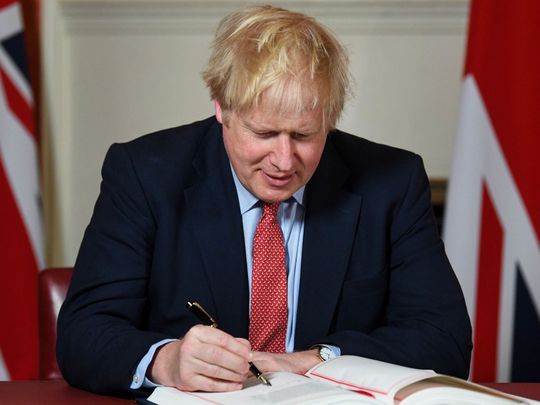 OPN Boris Johnson signing Brexit agreement-1580031297838