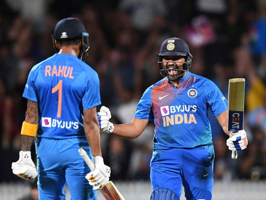 India's Rohit Sharma celebrates with KL Rahul, left, after hitting the winning runs in the super over.