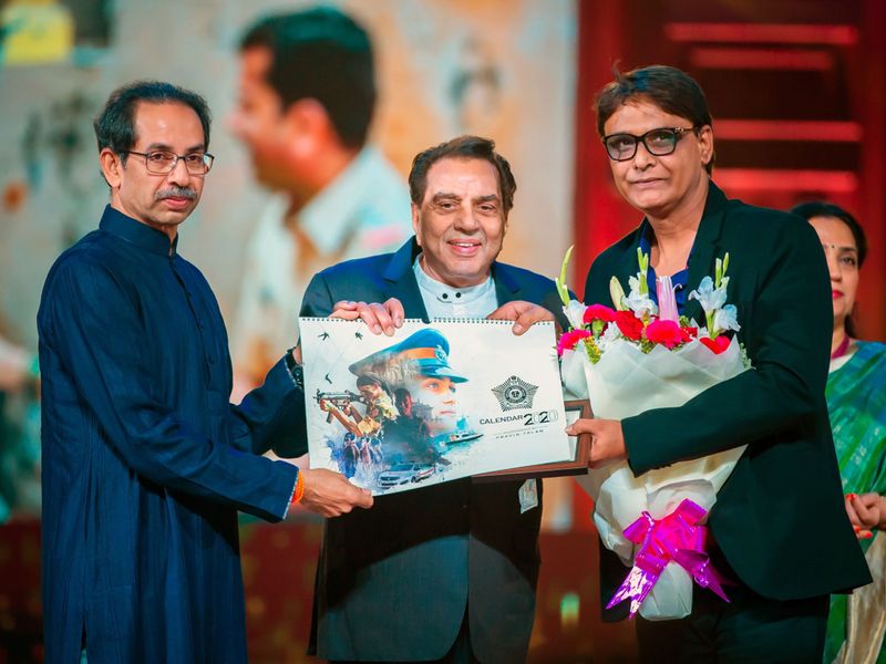 Maharashtra Chief Minister Uddhav Thackeray, veteran actor Dharmendra and photographer Pravin Talan 