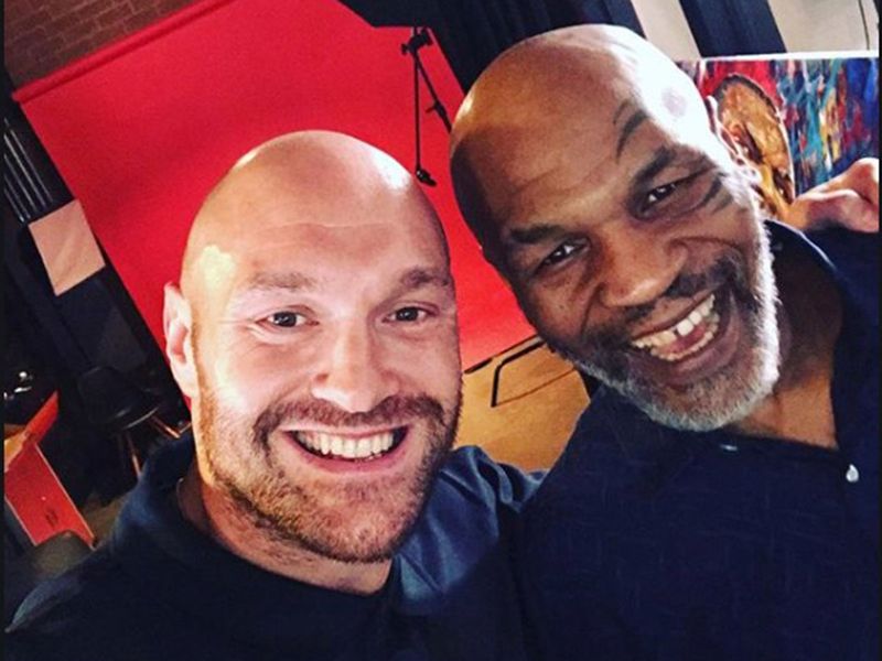 Tyson Fury and Mike Tyson.