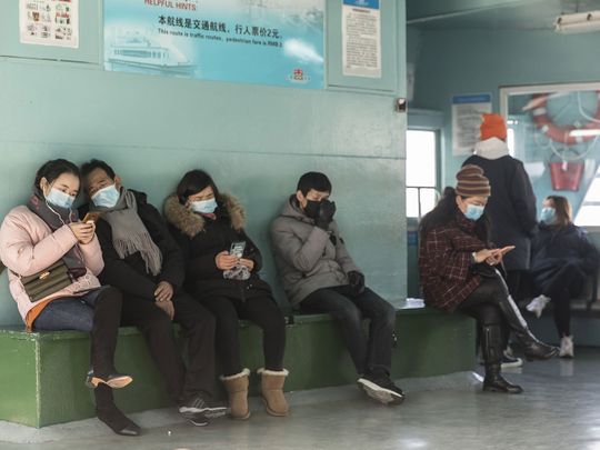 Passengers wearing protective masks