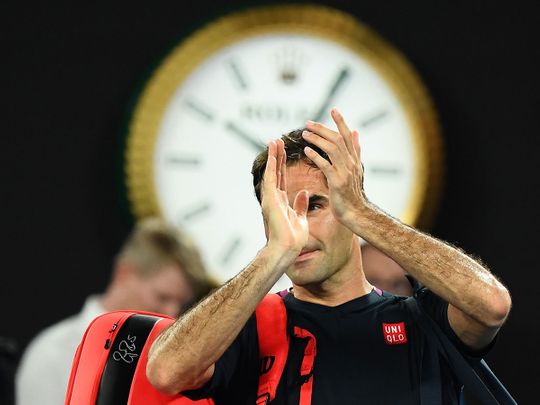 Switzerland's Roger Federer applauds after losing to Serbia's Novak Djokovic in the Australian Open semi-finals