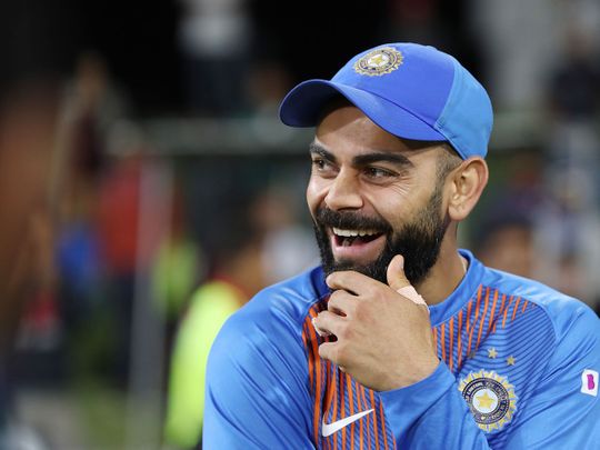 Indian captain Virat Kohli celebrates after winning the fifth Twenty20 cricket match between New Zealand and India at the Bay Oval in Mount Maunganu