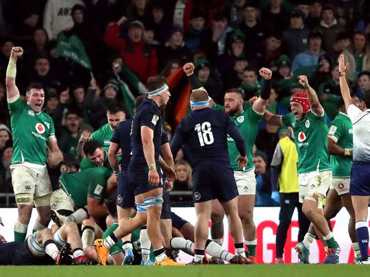 Ireland prevent Scotland from scoring a try during the Six Nations match at the Aviva Stadium in Dublin,