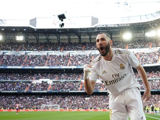 Karim Benzema celebrates his goal for Real against Atletico
