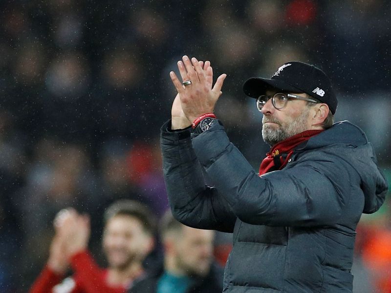 Liverpool manager Jurgen Klopp applauds fans after the 4-0 win over Southampton
