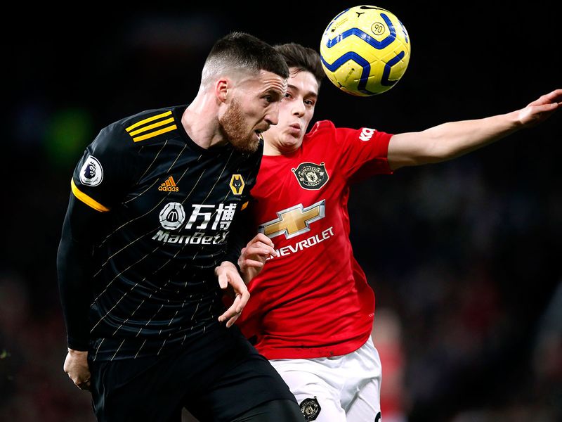 Manchester United's Daniel James, right, and Wolverhampton Wanderers' Matt Doherty battle for the ball in the 0-0 draw