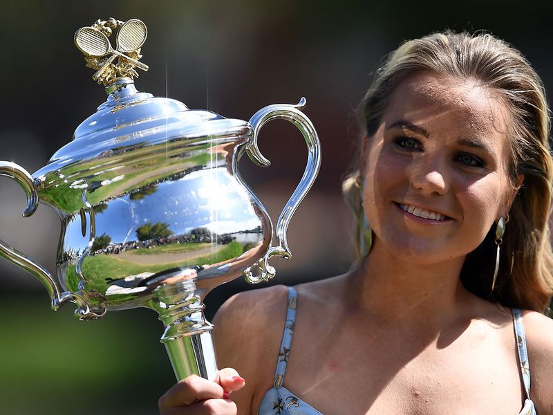 Sofia Kenin poses with the Australian Open winner's trophy 