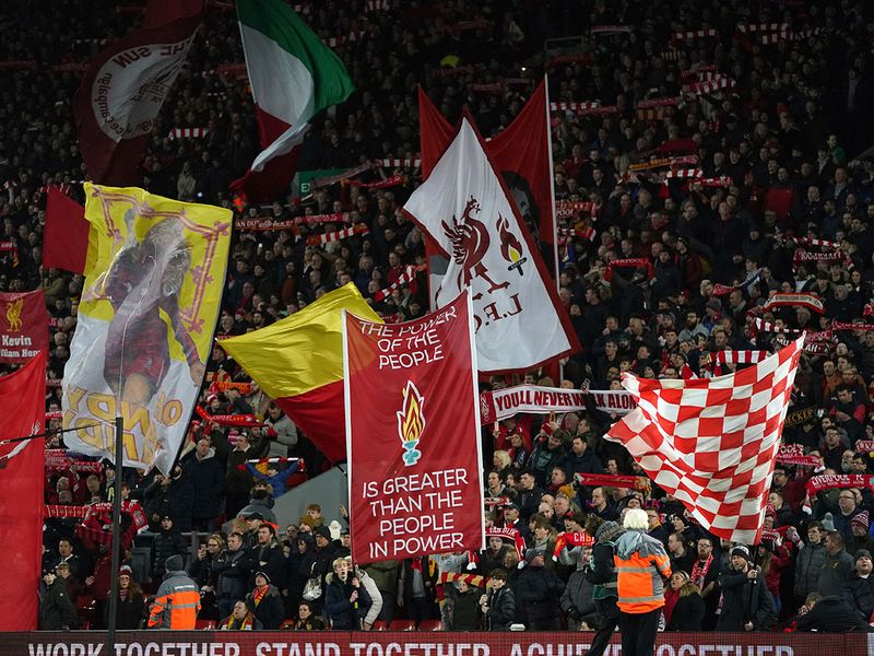 Liverpool fans cheer before the English FA Cup Fourth Round replay soccer match between Liverpool and Shrewsbury Town at Anfield Stadium, Liverpool, England, Tuesday, Feb. 4, 2020. (AP Photo/Jon Super)