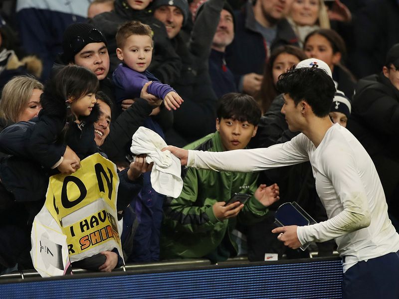 Soccer Football -  FA Cup Fourth Round Replay - Tottenham Hotspur v Southampton  - Tottenham Hotspur Stadium, London, Britain - February 5, 2020   Tottenham Hotspur's Son Heung-min gives his shirt to fans after the match                           REUTERS/David Klein