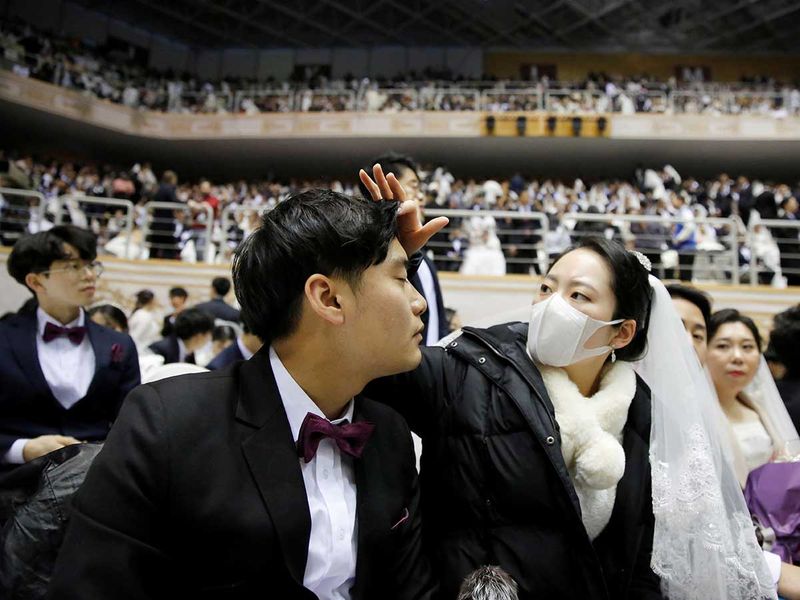 Copy-of-2020-02-07T064121Z_1710003277_RC2IVE941TJU_RTRMADP_3_CHINA-HEALTH-SOUTHKOREA-MASSWEDDING-(Read-Only)