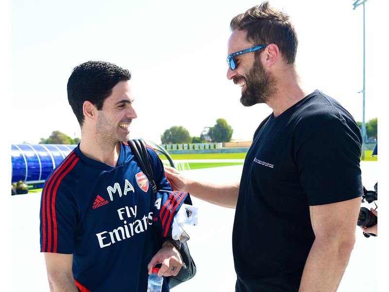 'A familiar face was at our training base earlier today! Good to see you again, Manuel Almunia,' tweeted Arsenal as the former Gunners goalkeeper popped in to say hello