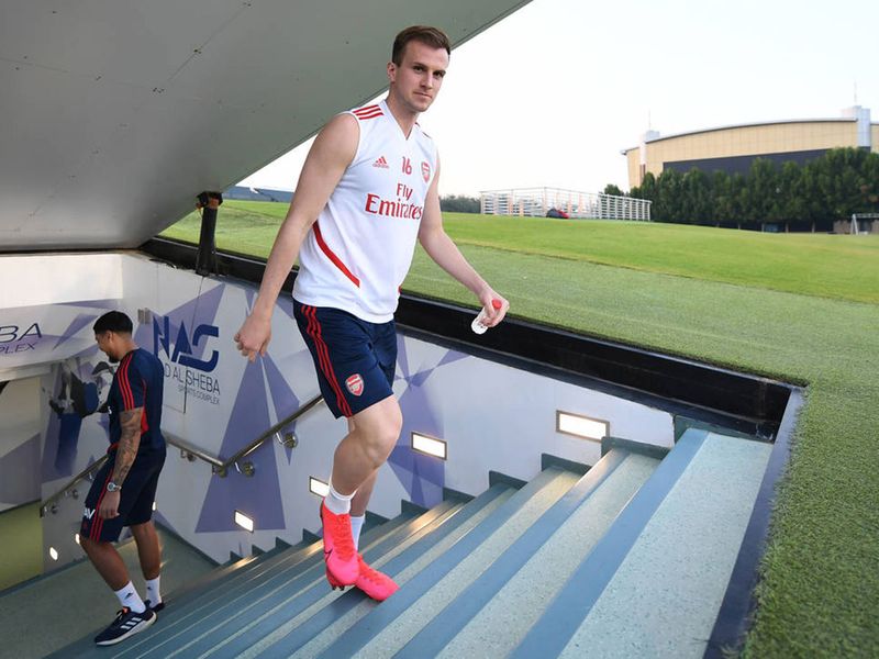 Rob Holding prepares to get down to training in Dubai at Nad Al Sheba