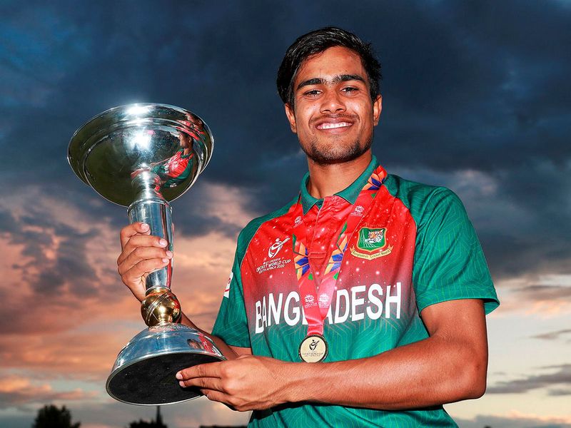 Bangladesh U19 cricket team captain  Mohammad Akbar Ali  pose with the ICC U19 Cricket World Cup trophy after Bangladesh beat India by 3 wickets in the Super League Final 