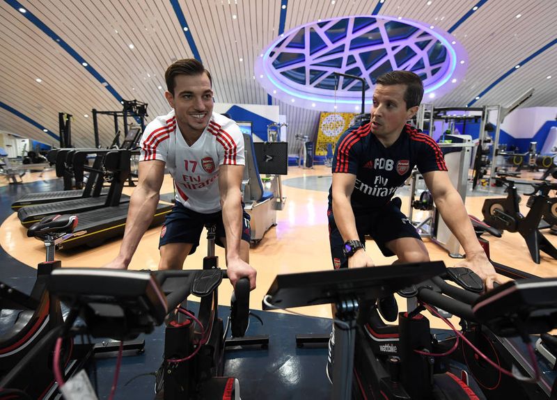 Cedric Soares with Arsenal physio Paulo Berreira 