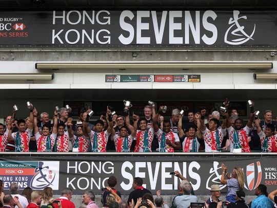  Japan rugby players chee after beating Hong Kong to qualify for the Sevens World Series