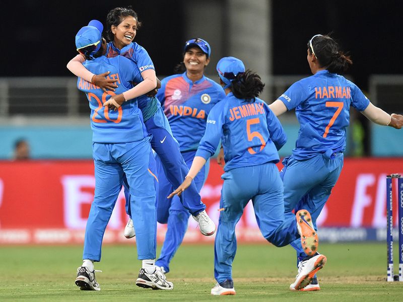 India's bowler Poonam Yadav (2nd L) celebrates bowling Australia's Ellyse Perry on her first ball during the opening match of the women's Twenty20 World Cup cricket tournament at the Sydney Showground in Sydney on February 21, 2020.