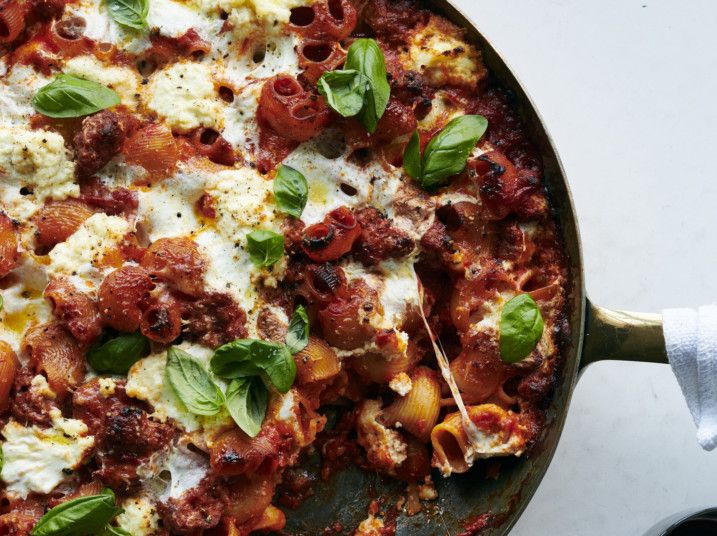 Cheesy baked pasta with sausage and ricotta.-1582461903388