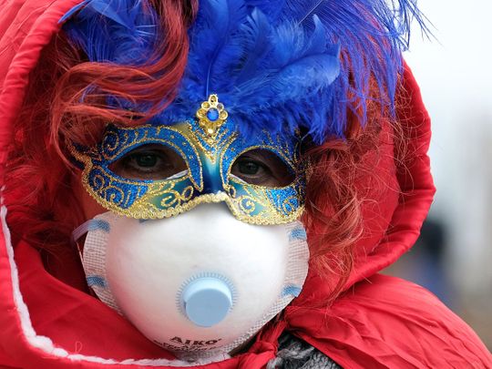 Masked carnival reveller