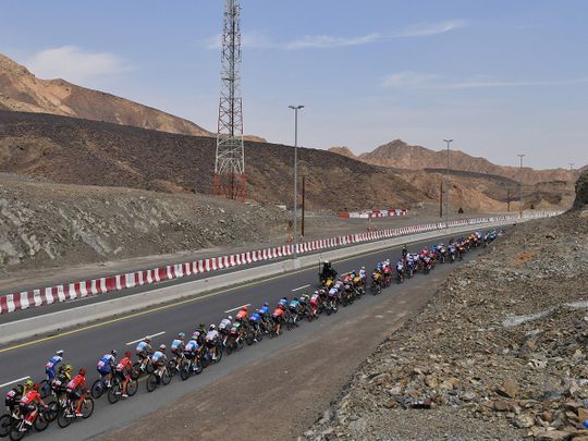 Cyclists on the road during UAE Tour Stage 2