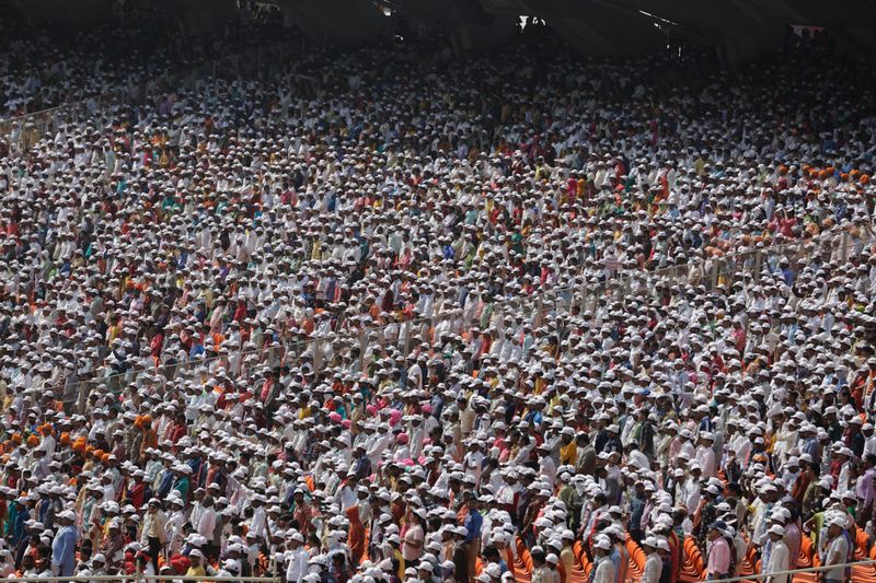 Indians attend the Namaste Trump event at Sardar Patel Stadium in Ahmedabad. 