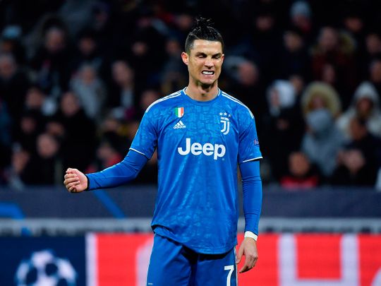 Juventus' Portuguese forward Cristiano Ronaldo reacts during the UEFA Champions League round of 16 first-leg football match between Lyon and Juventus at the Parc Olympique Lyonnais stadium in Decines-Charpieu, central-eastern France, on February 26, 2020. / AFP / Philippe DESMAZES