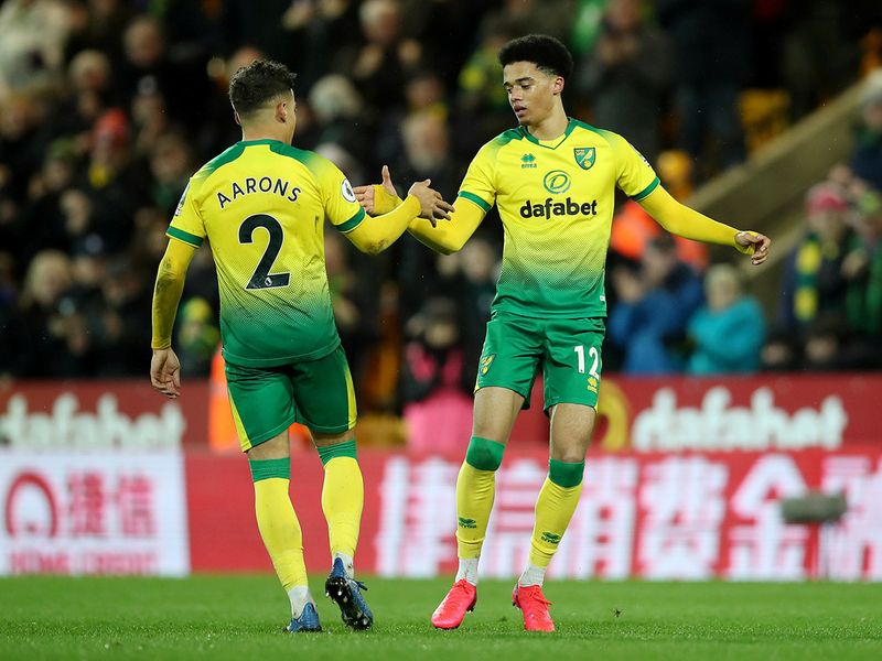 Norwich City's Jamal Lewis celebrates scoring their first goal with Max Aarons 