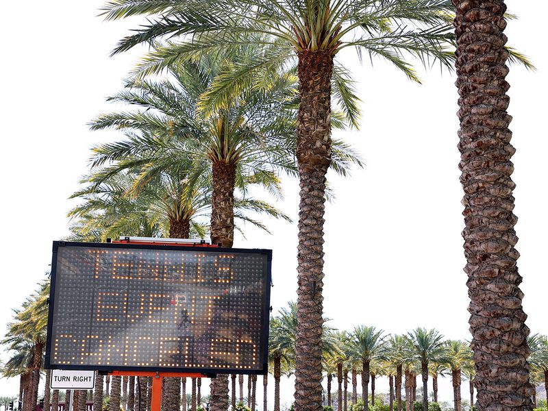 A 'Tennis Is Cancelled' sign flashes outside the Indian Wells Tennis Garden