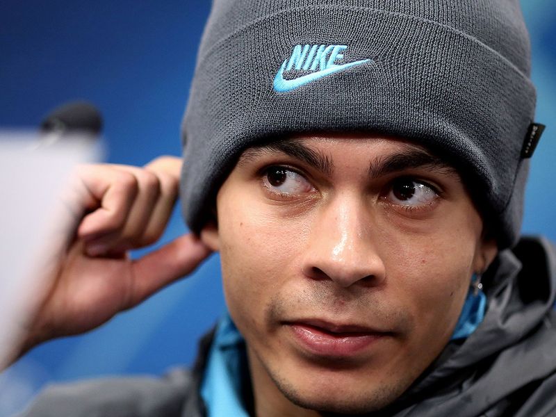 Tottenham's English midfielder Dele Alli listens during a press conference on the eve of the UEFA Champions League football match between Leipzig and Tottenham, in Leipzig