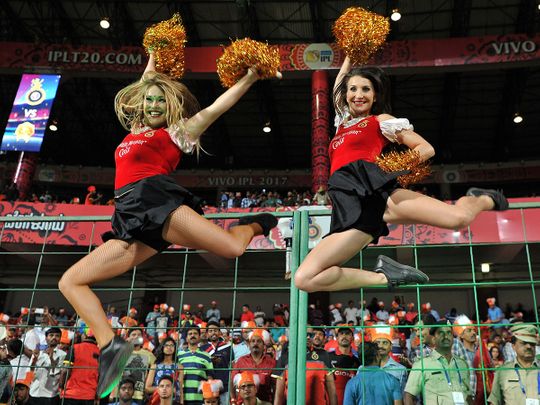 In this file photo taken on April 28, 2017, Royal Challengers Bangalore cheerleaders.  The start of the Indian Premier League, the world's most lucrative cricket competition, has been postponed from March 29 until April 15 over the coronavirus, the Indian cricket board said on March 13. 