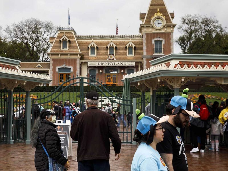Disney to require masks again at Florida, California parks