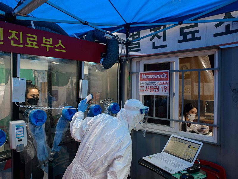 South Korea dials up virus testing with hospital 'phone booths'